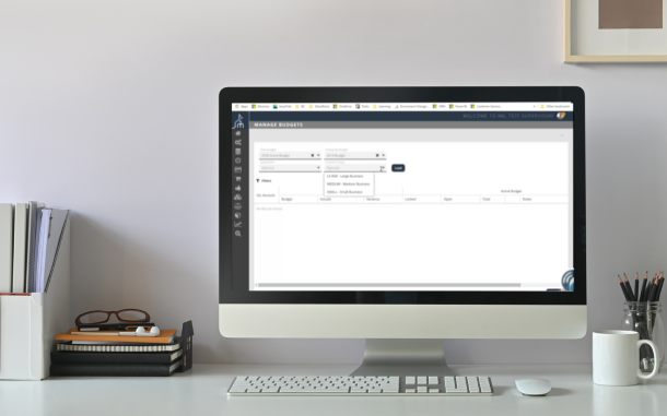 Image of computer on desk displaying the Moniroo Budgeting app
