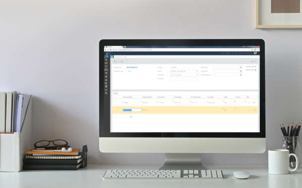 Image of computer on desk with Purchase Requisition Module open