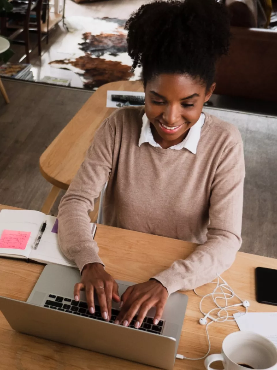 Woman using computer at desk