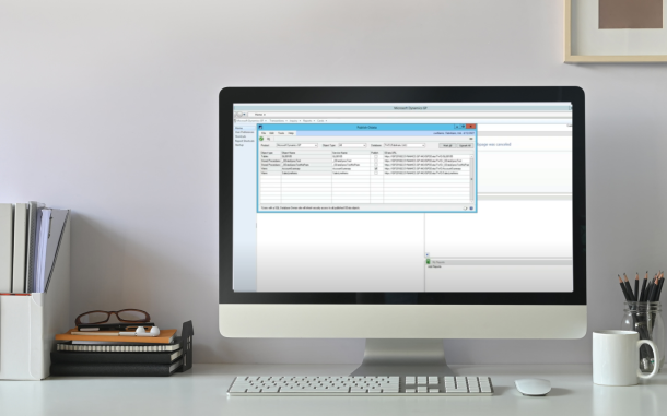 Image of computer on desk with Reporting Module
