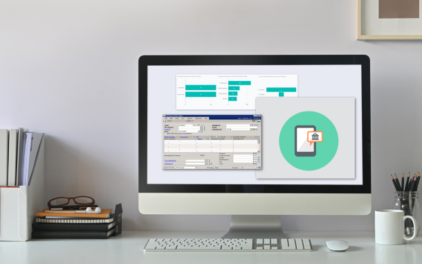 Image of computer on desk with High-Volume Electronic Bank Reconciliation